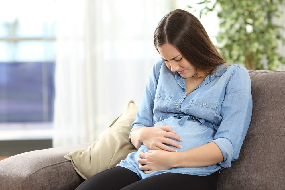 Болка в стомаха по време на бременност: от лека до опасна